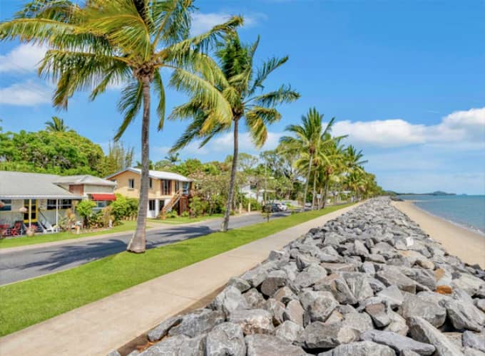 Palm-lined esplanade at Machans Beach Community Hall, Cairns, where Tropical Songfest workshops take place